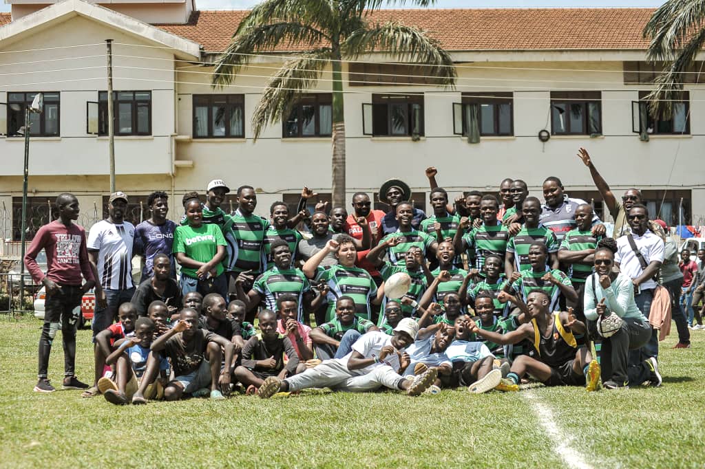 BoksUg's tweet photo. Late post, but must. 7/13 man in fram 2 are in frame 1. Get this, 2 compliments 1. May we never forget #'NagoBoys' contribution to the Rugby fraternity. Work in dark but shine brighter on belief n hard work.  Congrats @NaguruHomeboys🥳🥳🥳 #MCM  #Bros 💙💚🤍❤🖤 https://t.co/9HNb2Ytdk2