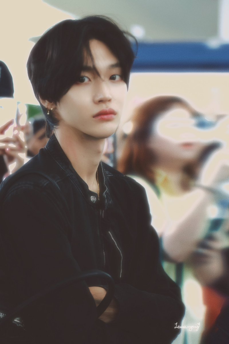 So, are you saying the men on the left are passing around a report that harshly criticizes the boy's appearance on the right?