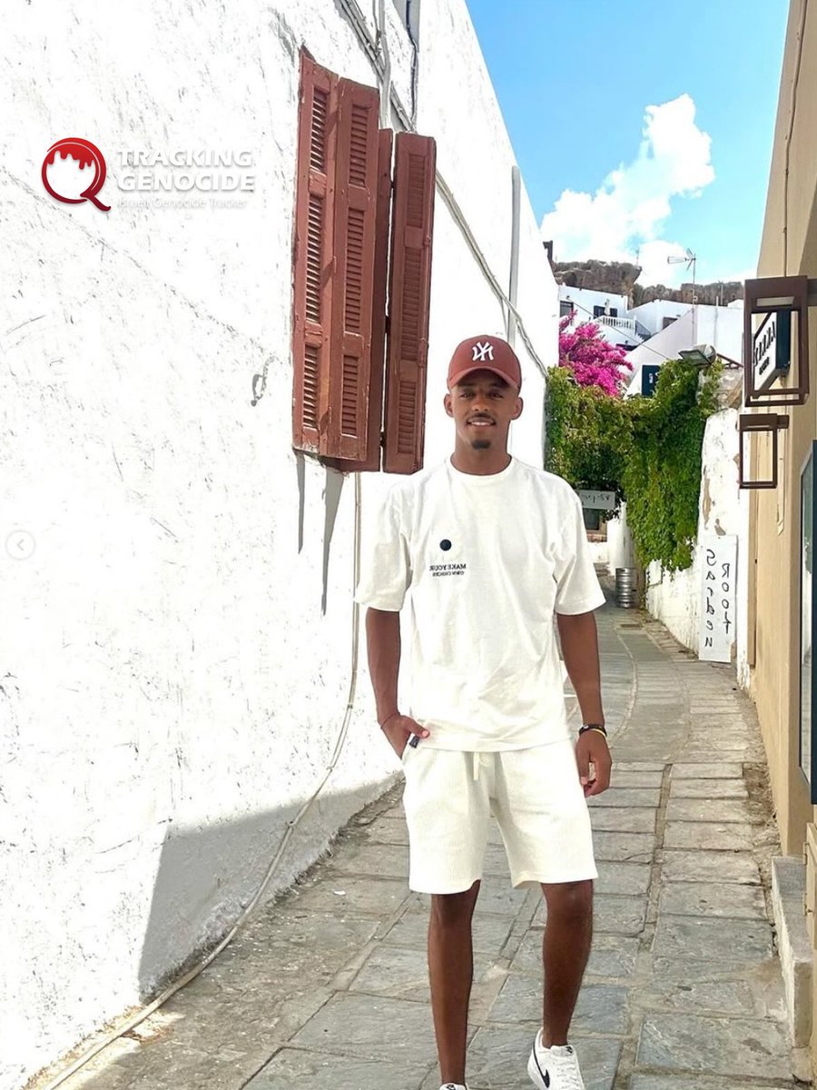 trackingisrael's tweet image. Israeli Ethiopian reservist Moshe Ananya from the Givati Brigade posed for photos amid the ruins of Gaza City, documenting his role in genocide there.

After completing his first reserve service in Gaza, he took a vacation to Lindos, Greece.
