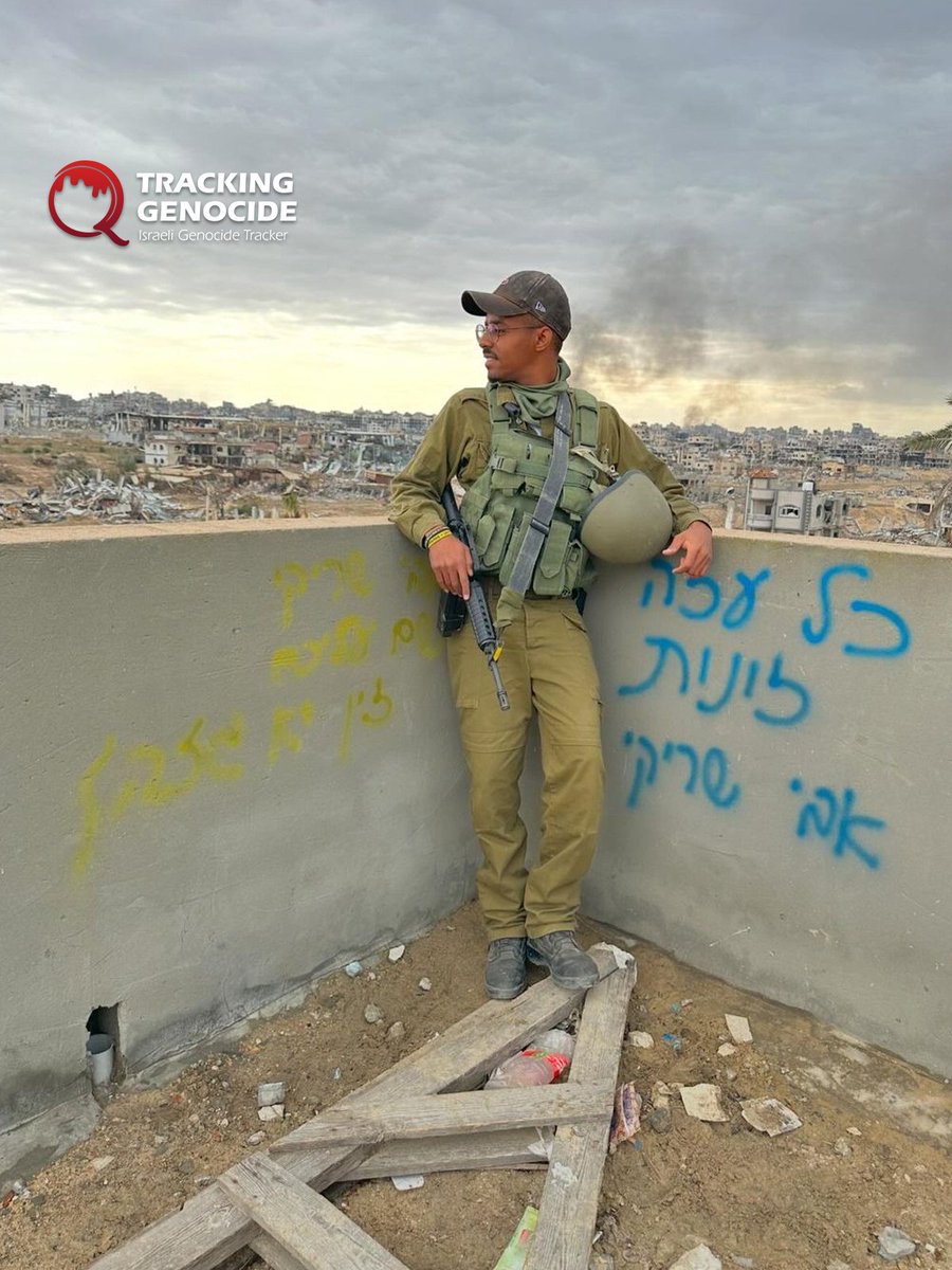 trackingisrael's tweet image. Israeli Ethiopian reservist Moshe Ananya from the Givati Brigade posed for photos amid the ruins of Gaza City, documenting his role in genocide there.

After completing his first reserve service in Gaza, he took a vacation to Lindos, Greece.