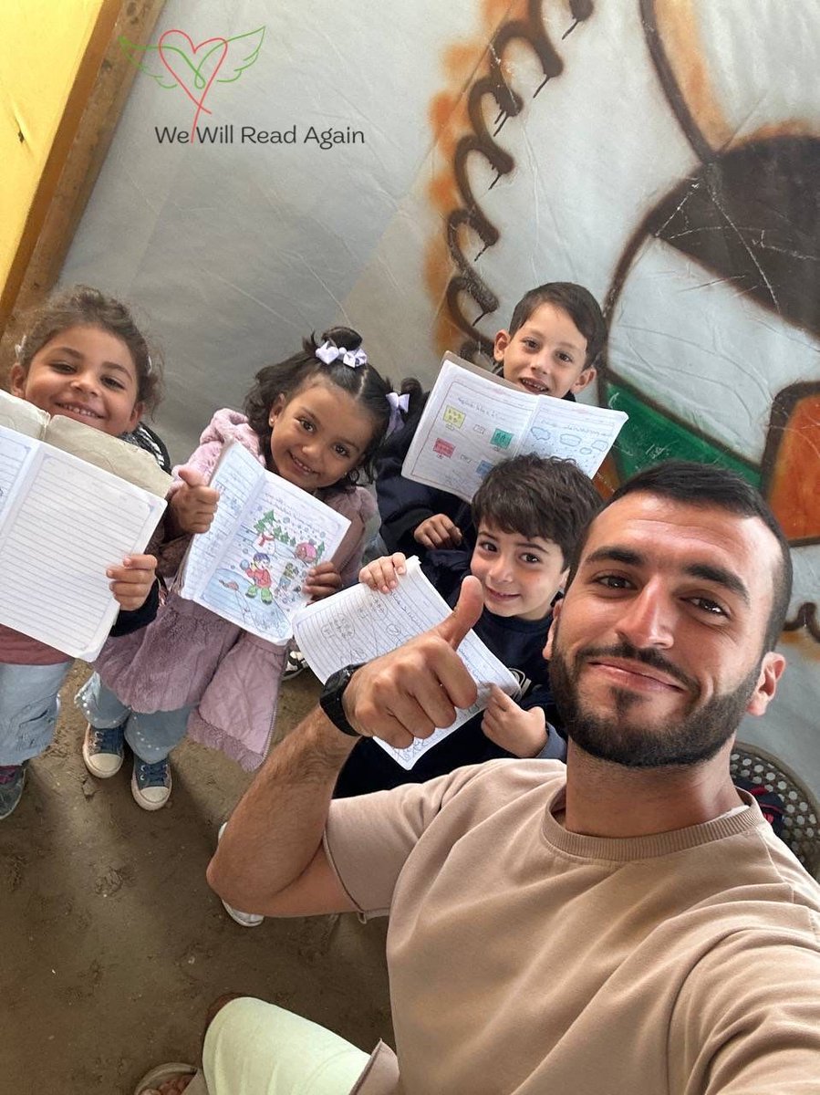 GazaGreatMinds's tweet photo. Seeing our little ones proudly holding up their notebooks fills us with hope and reminds us of the power of learning. 

Just look at their adorable smiles! 

P.S. Proud teacher, too! 

❤️🖤🤍💚
#WeWillReadAgain https://t.co/DG3h4A0CaO