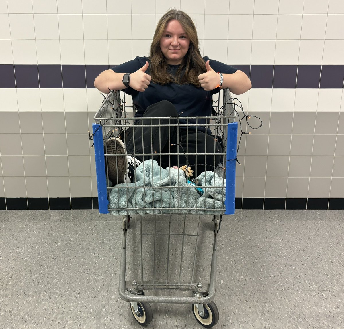 purbalite's tweet photo. Senior Angela Brown brings in a shopping cart for anything but a backpack day. https://t.co/ENVPUJbSpW