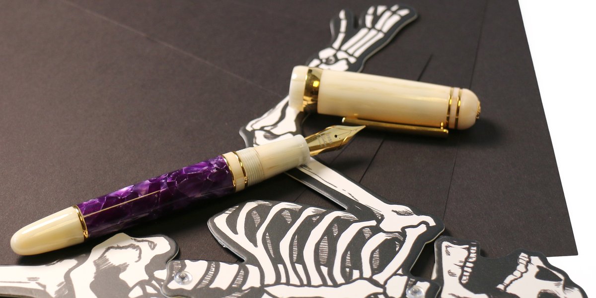PenChalet's tweet photo. Make no mistake, I'm here for the candy... and the fountain pens!🍭🖋️ We are feeling all the haunted vibes with the Laban 325 Wisteria fountain pen! And all of our Top 20 Halloween Picks for 2024: https://t.co/rB9Brik3uC #LabanPens #Laban325Wisteria #FountainPens #HalloweenPen https://t.co/mJgAsTcbHA
