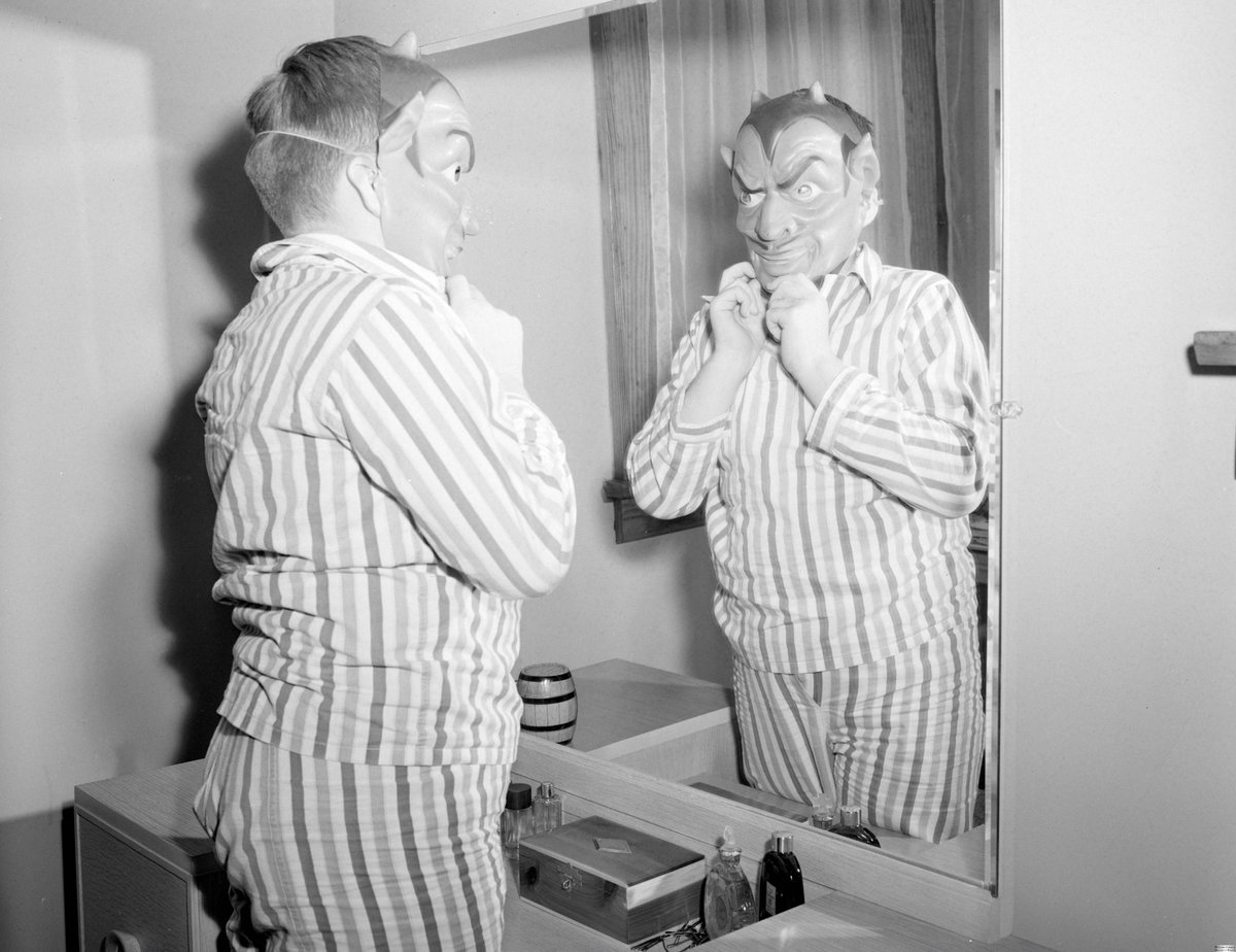 Do you have your Halloween costume yet? Check out these photos of a young boy admiring his Halloween costume from 1951. Unspecified location, Central Illinois, McLean County Museum of History. #halloween #costume #localhistory