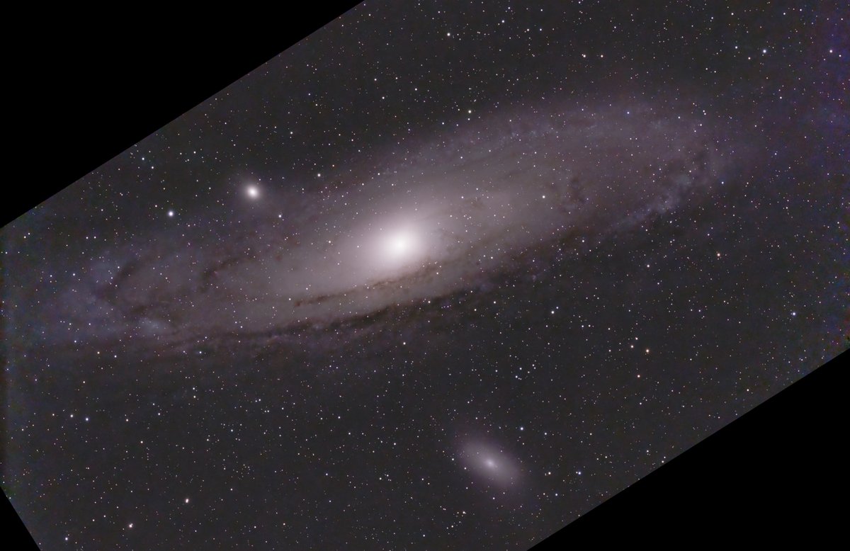 Andromeda galaxy with new mosaic function.  Incomplete data collection because the galaxy rose to too high an altitude near the end. That's why there are dark bands in the corners. Still, not bad for a first attempt at mosaic (combining smaller images to cover a larger area).