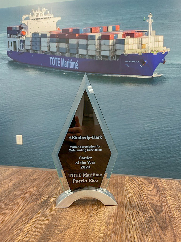 TOTE_Maritime's tweet photo. #TOTEPR was named 'Carrier of the Year' by Kimberly-Clark! The recognition was earned by our on-time performance, reliable delivery, and exceptional customer service. 

Thanks to Kimberly-Clark for trusting us with your business. It's an honor to serve #PuertoRico with you. https://t.co/5kUn7oYdrO
