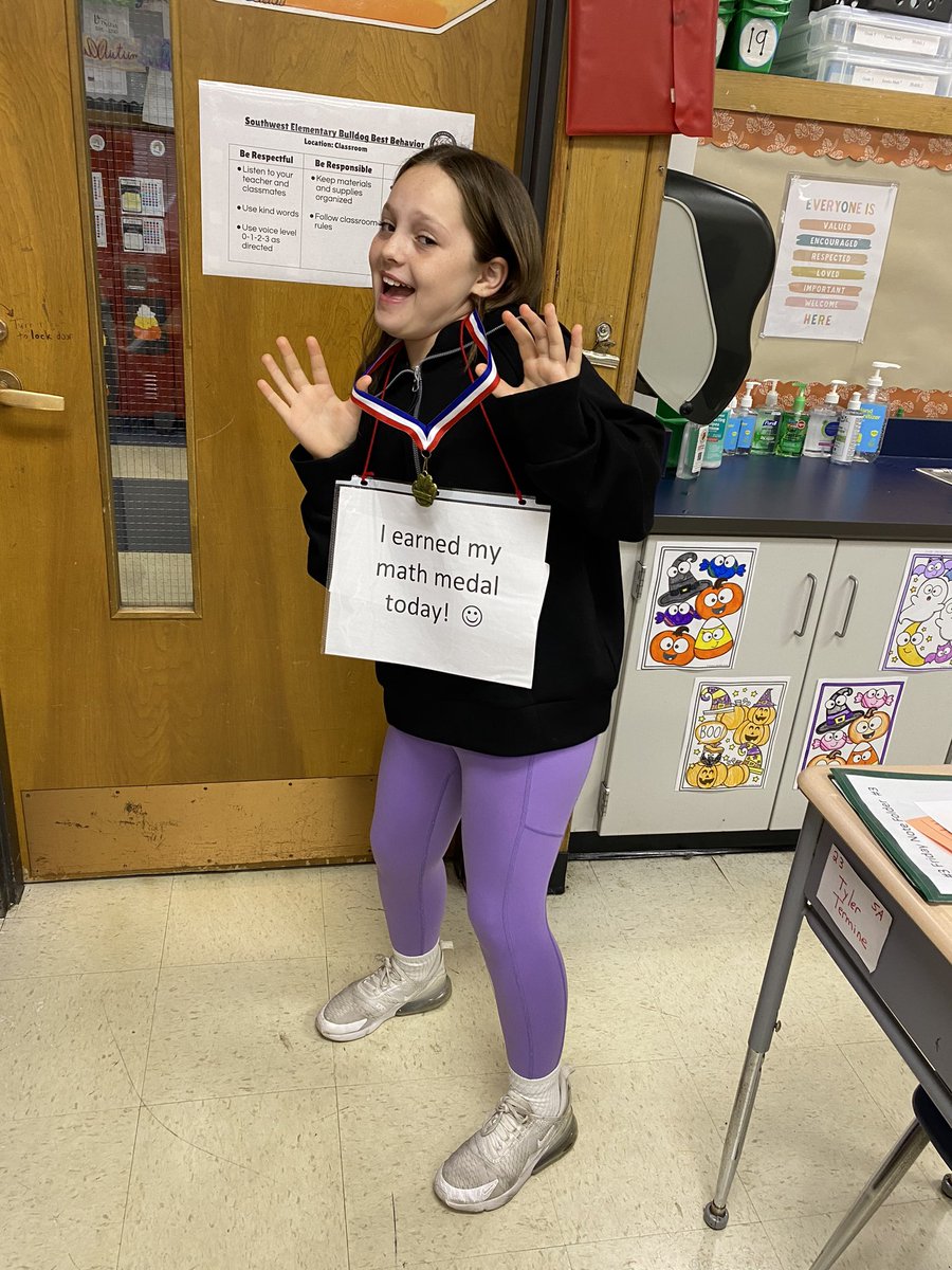 Isla is the first student is Mrs. Grebenor’s math class to earn her math medal.  We are so proud of her!  #BeEvergreen