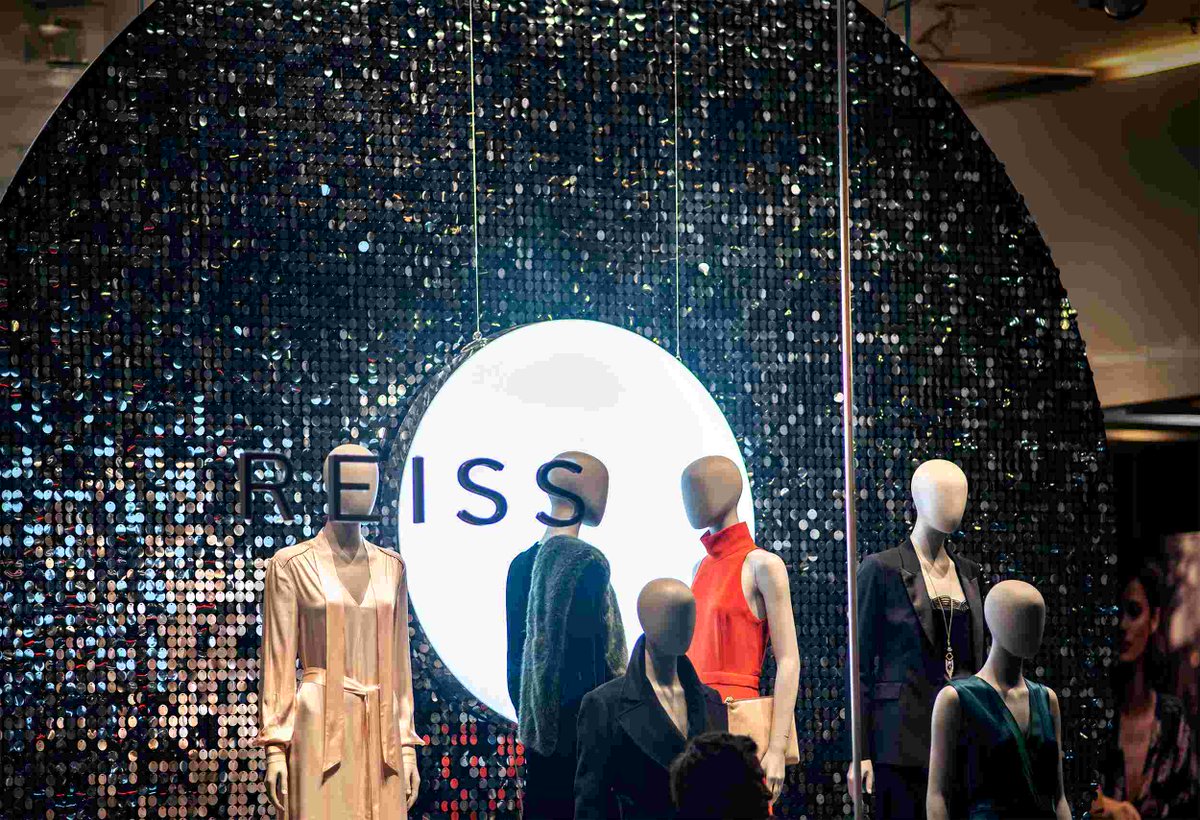 Shimmerwalls's tweet photo. Not looking for a pop of color? ✨Shimmerwalls brings the perfect touch to sleek, neutral aesthetics too! Our black sequin circle backdrop fit seamlessly with Reiss’s refined style, adding a captivating shimmer. 

See more in client case study: https://t.co/kqLPn69LIw https://t.co/5TxYLC4YHB