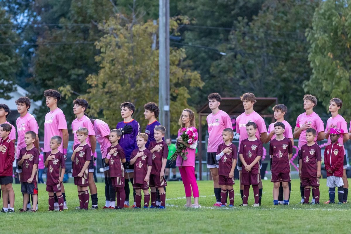 PCCS_Official's tweet photo. The Plymouth Boys Soccer Team raised over $10,000 to support Sharon Mackey, a Plymouth HS teacher on leave due to her battle with multiple cancers. It was an amazing evening, with packed stands and a stunning pink sky! 💖 #PlymouthBoysSoccer #PinkOutGame https://t.co/ZTcLZ3S39k