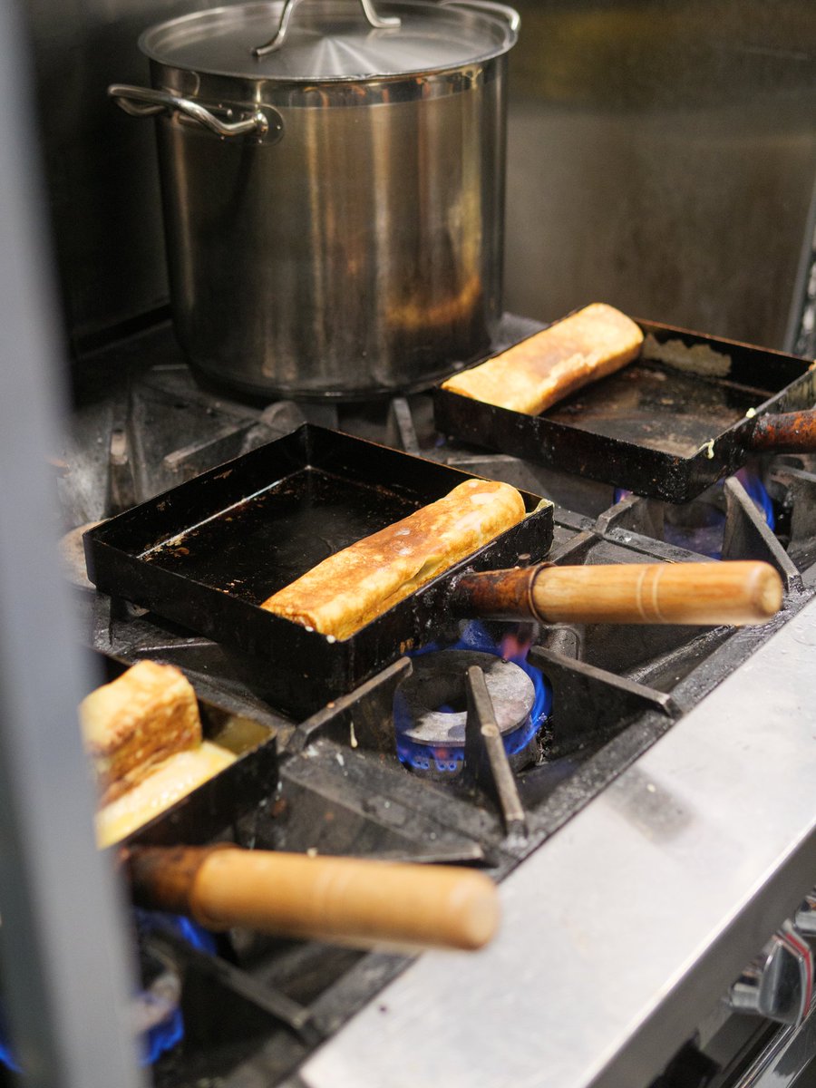 m_restaurants's tweet photo. The most challenging aspect of making tamago is heat control. Chef Peter turns, flips, and rolls the tamago, controlling the heat, for it to become the desired texture based on visual and experience. 

#msushi_cary #m_restaurants #tamago #SUSHI https://t.co/d5AFFa8j36