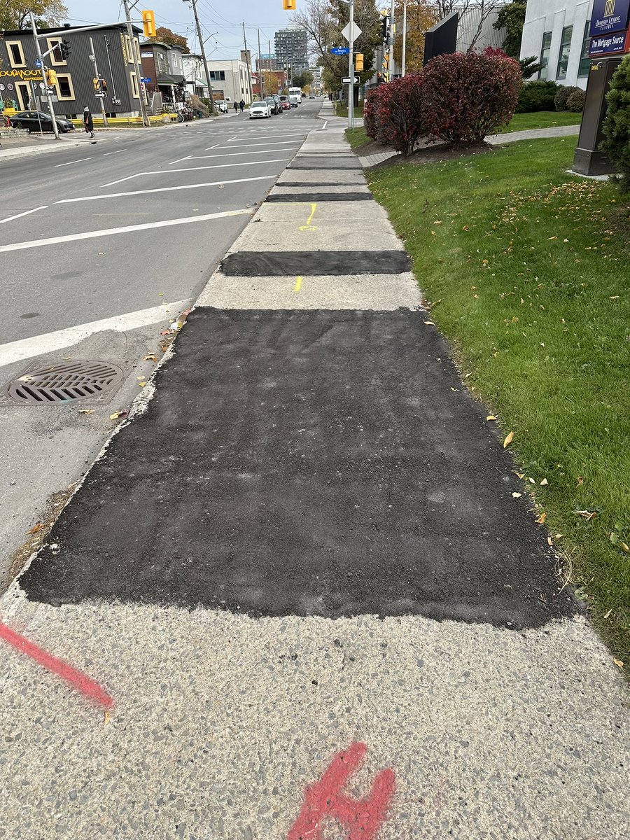 AusterityOtt's tweet photo. “stripes” - new work by Ottawa artists Watson/Sutcliffe; explores the colour pattern of alternating bands of grey and black, symbolizing municipal attitudes towards beauty. Mixed media, concrete, asphalt, yellow spray paint. https://t.co/LxfPaHfTjr