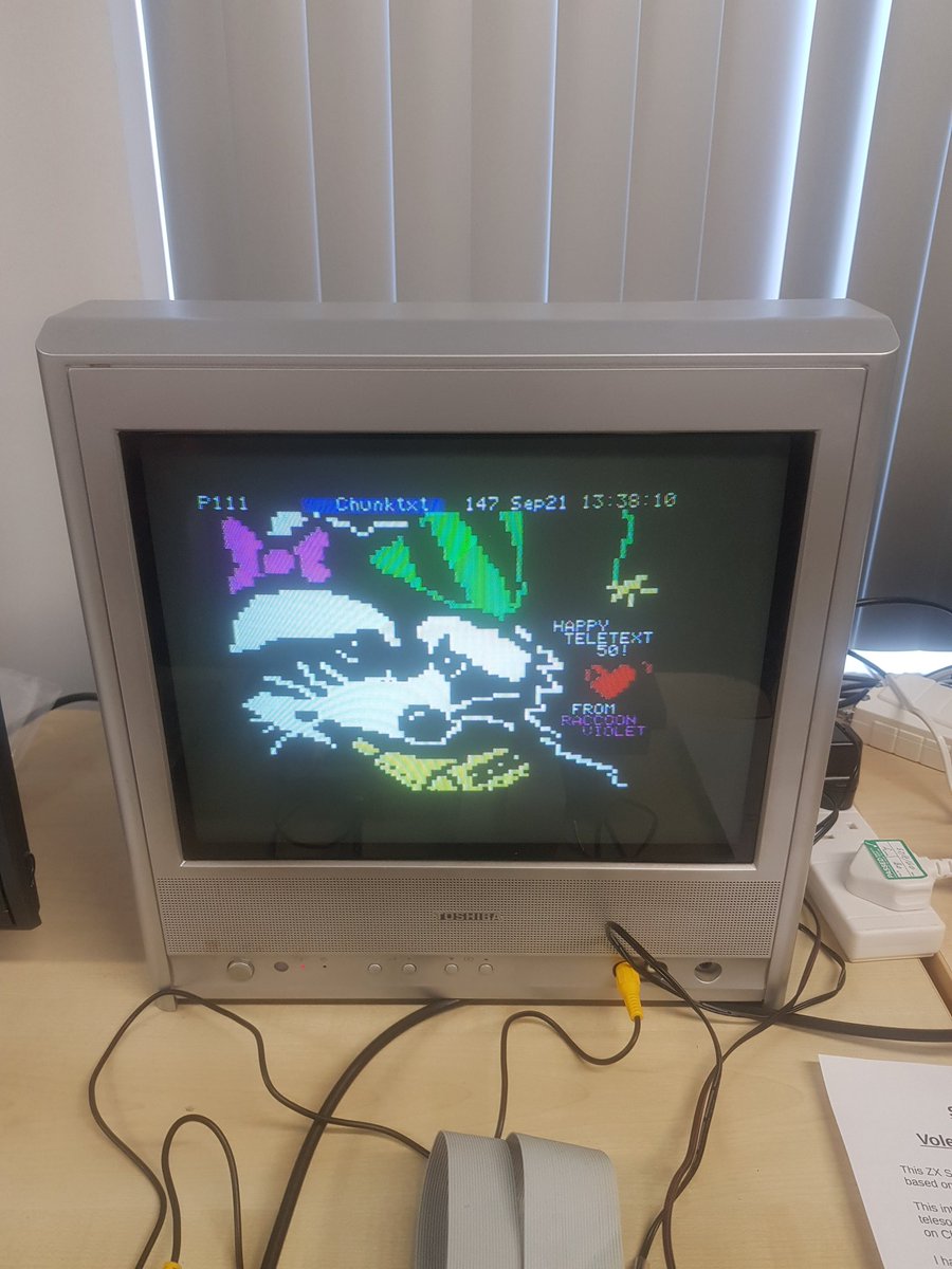 #Teletext50 art exhibition on 🇫🇮 Yle Text
Featured #teletext artist of the day: <a href="/ProcyonViolet/">🏳️‍⚧️ Violet Procyon</a>

yle.fi/aihe/tekstitv?…

It wouldn't be a party without Violet's raccoon! Also pictured at <a href="/computermuseum/">Computing History</a>, Cambridge, on <a href="/ZXGuesser/">Guesser</a>'s Spectrum+ with TTX adapter. 🦝

#pixelart #ceefax