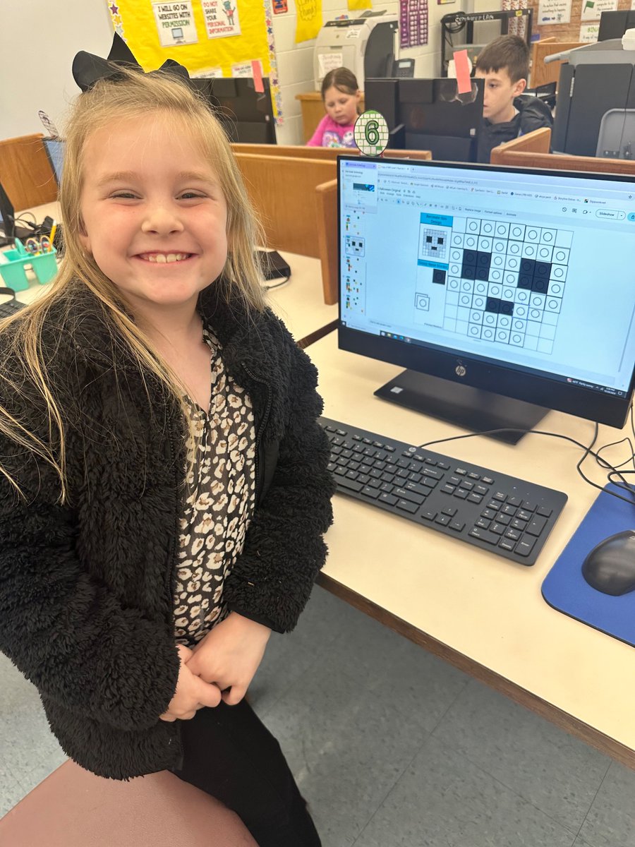 HoldenTheTech's tweet photo. 🎃 👻 Today our students got techy with Halloween-themed pixel art! 🖥️ 🌟 Using drag and drop and copy and paste skills, they created spooktacular designs! Check out our festive creations! #pixelart #halloweenfun #techskills https://t.co/C0vzoJVF16