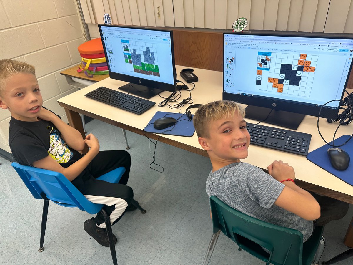 HoldenTheTech's tweet photo. 🎃 👻 Today our students got techy with Halloween-themed pixel art! 🖥️ 🌟 Using drag and drop and copy and paste skills, they created spooktacular designs! Check out our festive creations! #pixelart #halloweenfun #techskills https://t.co/C0vzoJVF16