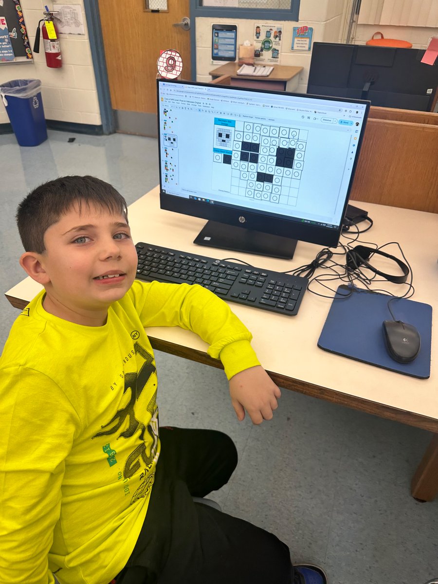 HoldenTheTech's tweet photo. 🎃 👻 Today our students got techy with Halloween-themed pixel art! 🖥️ 🌟 Using drag and drop and copy and paste skills, they created spooktacular designs! Check out our festive creations! #pixelart #halloweenfun #techskills https://t.co/KGpWssKbFn