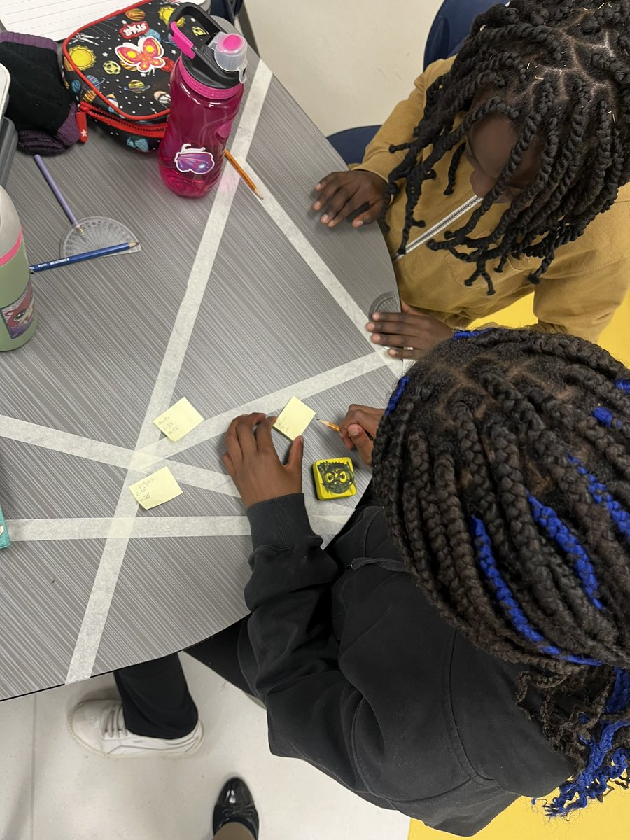 Working together to strengthen our protractor skills!