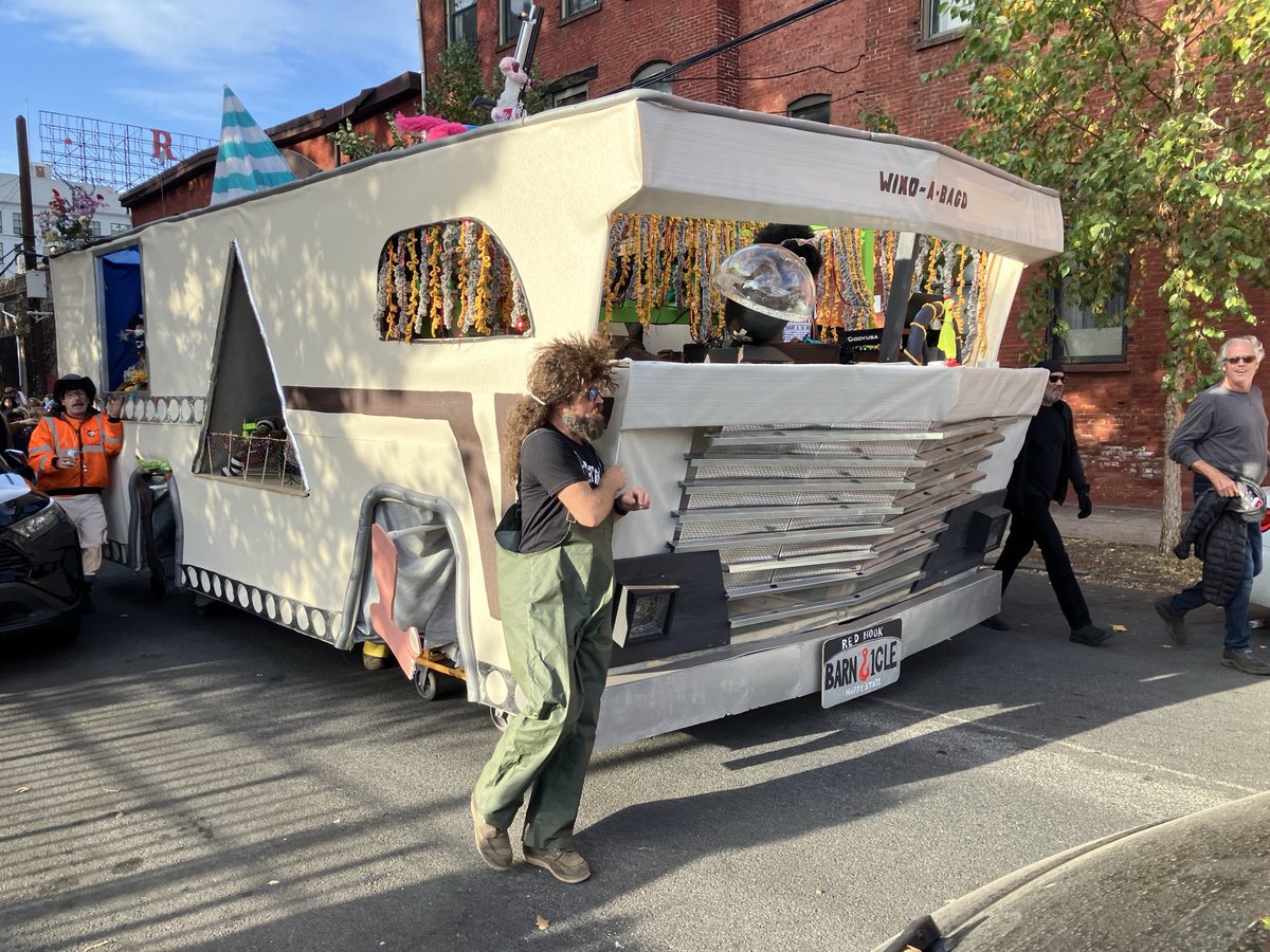 walkingtogitmo's tweet photo. Raccoon-infested #winnebago float for #barnacleparade 2024 celebrating the neighborhood’s survival of #hurricanesandy 2012. https://t.co/a4TbuadmmH