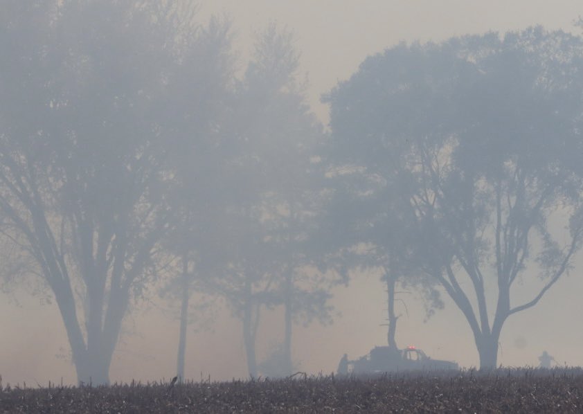 SnopekTim's tweet photo. A combine fire in Oconomowoc spread to some grass, a corn field and into a wooded area. The fire located on Golden Lake Road north of I94. At least a half a dozen fire depts. are on the scene. Time of call 1:23 firefighters still on the scene at 3:30. https://t.co/bLKW7MlPPP
