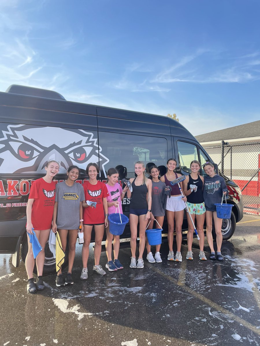 West CC Girls Cleaning &amp; Detailing Vans for their trip  to State