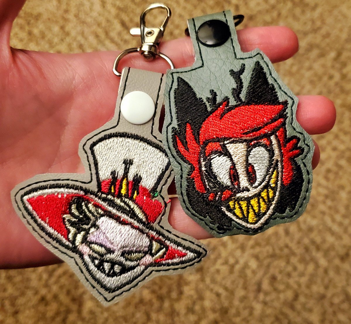 otfreakingp's tweet photo. My partner went to a local convention this weekend and brought these home for me! They're so cute aaaaa! #HazbinHotel #radioapple https://t.co/ohn4cPCGqE