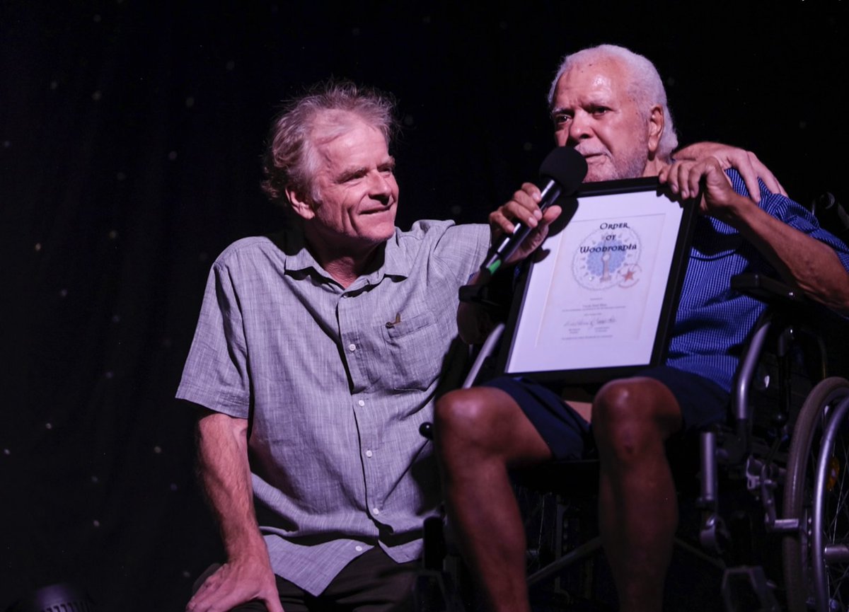 Woodfordia's tweet image. At our #ProgrammeLaunch Uncle Noel Blair, beloved Jinibara Elder &amp;amp; long-time #Woodfordian, was awarded the Order of Woodfordia for his outstanding contribution by our President Lachy Brown. Explore the Programme: woodfordfolkfestival.com
📸 #marekknappe #jinibara #woodfordia