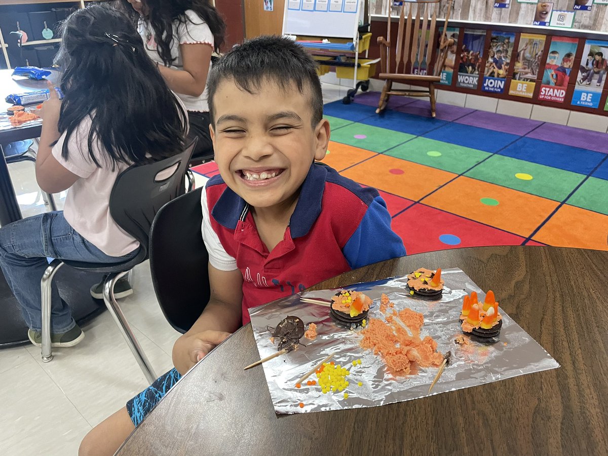 KatyHafner's tweet photo. Homework huddle was a success again tonight. Who doesn’t love cookies, chocolate and getting a little messy? We do! I just love seeing these smiles…on the kids faces too! 🎃 #coolclub #cookiesforthewin #JackOLanterns #DreamItDoIt https://t.co/7NwxYdUXON