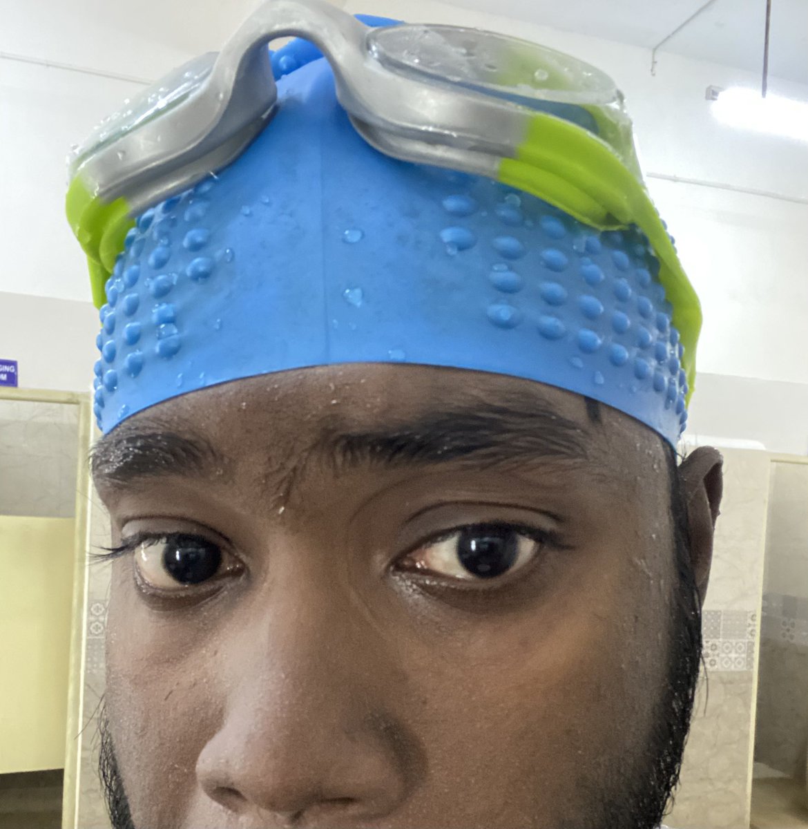 TravenzugRider's tweet photo. Goggle marks around my eyes, giving me that 'just finished a good swim' look. Who needs designer sunglasses when you've got natural goggle tan lines, right? 🤭🧿 #LongDistanceSwimming https://t.co/upHVrBWOoZ