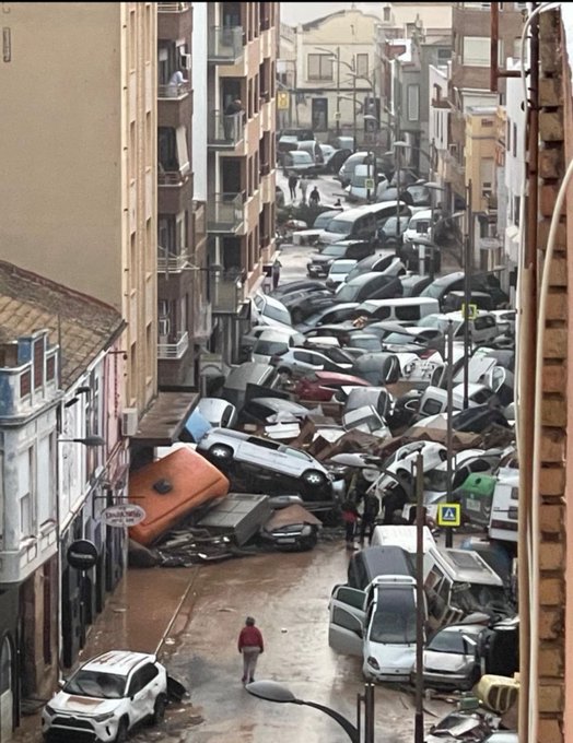ExtinctionR's tweet photo. At least 63 people have died in Spain after flash flooding smashed a large area in the south and east of the country. These disasters are only getting worse, and stopping the industries and systems driving climate collapse is the only rational response. 
https://t.co/Dskn20UqwV https://t.co/CAAVZp0OrY