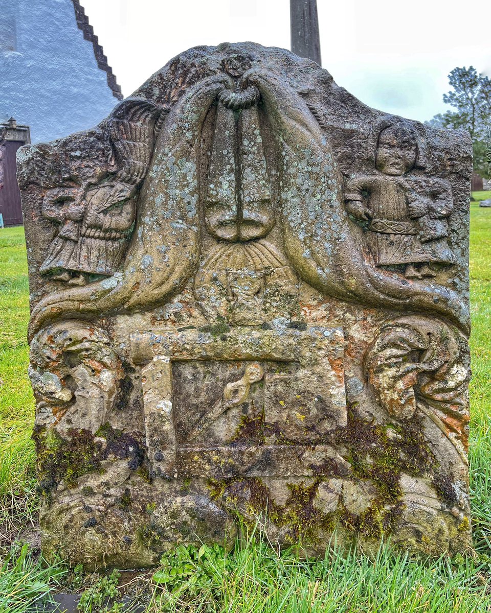 Delightful hip swinging, wing swishing, trumpet blowing  Angels of Resurrection adorn a scene of an axe, set square &amp; pick, all about to be covered over by the drapes. The globe tells us that this is our everything.