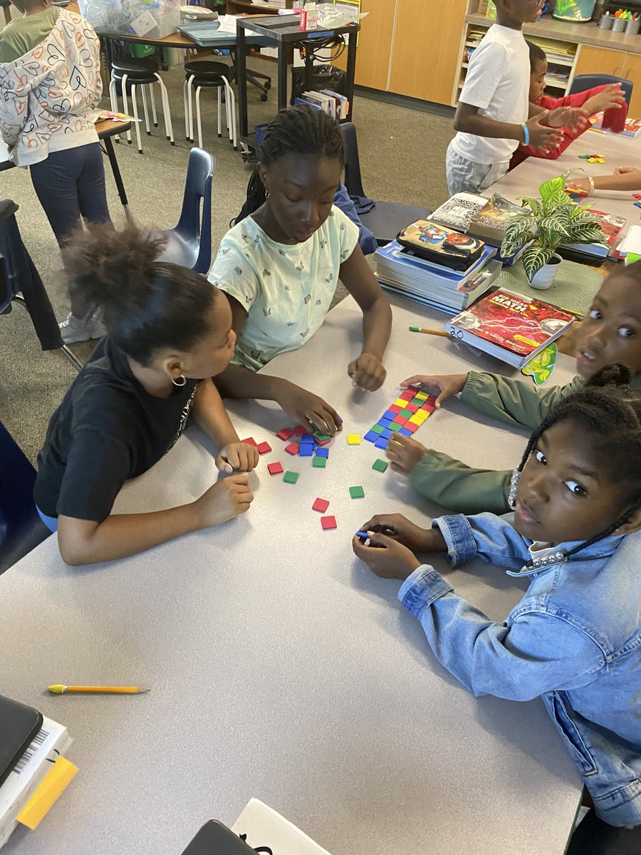 PRE_Shortman's tweet photo. Students using manipulatives to master multiplication using the area model.  #poloproud  #PRE_explorers https://t.co/LDZ6BnZVkD