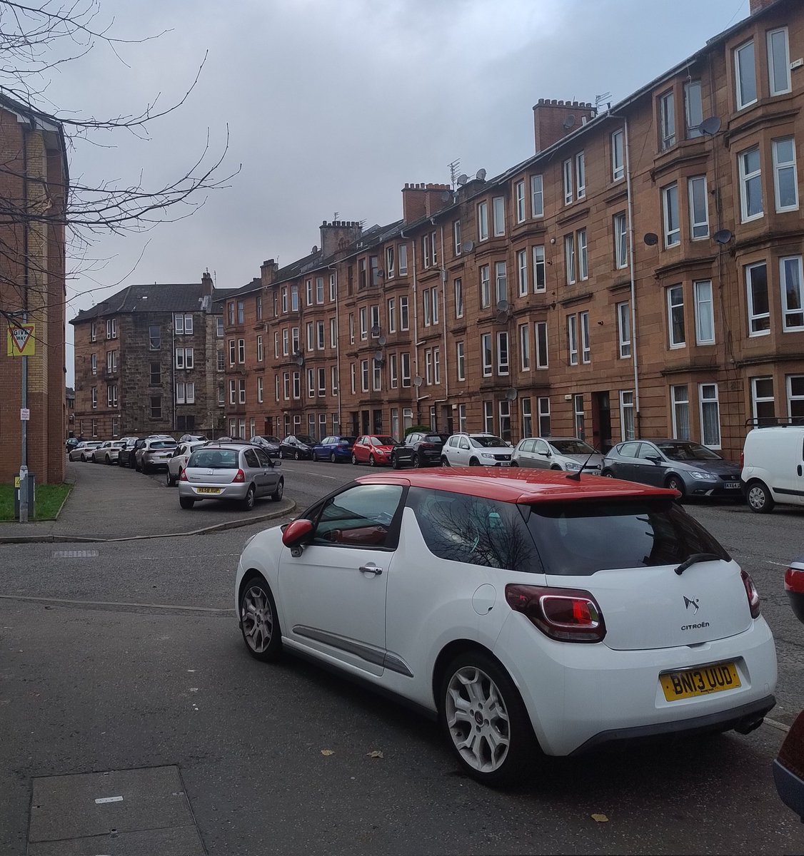 5 min walk from the train station shows what year-on-year growth in vehicles looks like. Not the most dramatic pictures, but it's illustrative how mundane &amp; normalised this all is.

Blocked paths, crossings, sight lines, every inch of street space contested by ever more vehicles.
