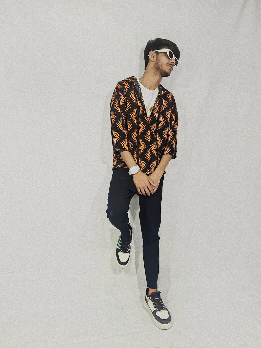 Officialbariib's tweet photo. Bold patterns, clean backgrounds – that’s how you make a statement! 🎯🖤✨
Rocking the black and orange like never before 🧡🕶️

#stylishpose #whitebackdrop #urbanstyle #model #ootd #mensfashion   #creativepost #menwithstyle https://t.co/ScGPvPMiQ1