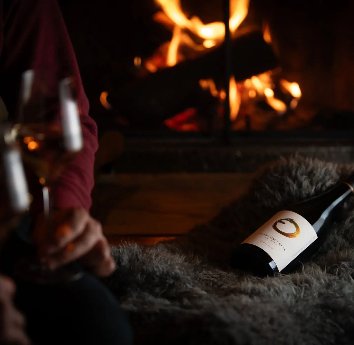 Fire blazing, glass full of premium <a href="/phantomcreekest/">Phantom Creek Estates</a> wine. A perfect way to relax &amp; escape the unpredictable fall weather.

Try these outstanding from this award winning BC winery:
Riesling 2022 VQA +58467 
&amp;
Estate Cabernet Franc 2021 VQA
+90203 BCL EXCLUSIVE