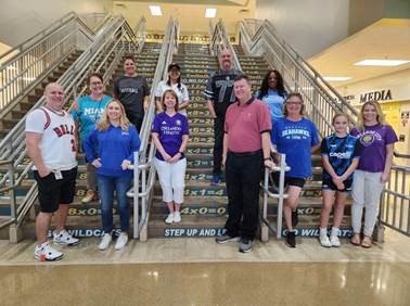 We’re saying “Peace Out” to drugs and bullying by wearing our brightest tie-dye and colors! Plus, WOE is teaming up against drugs and bullying with our special team shirts!