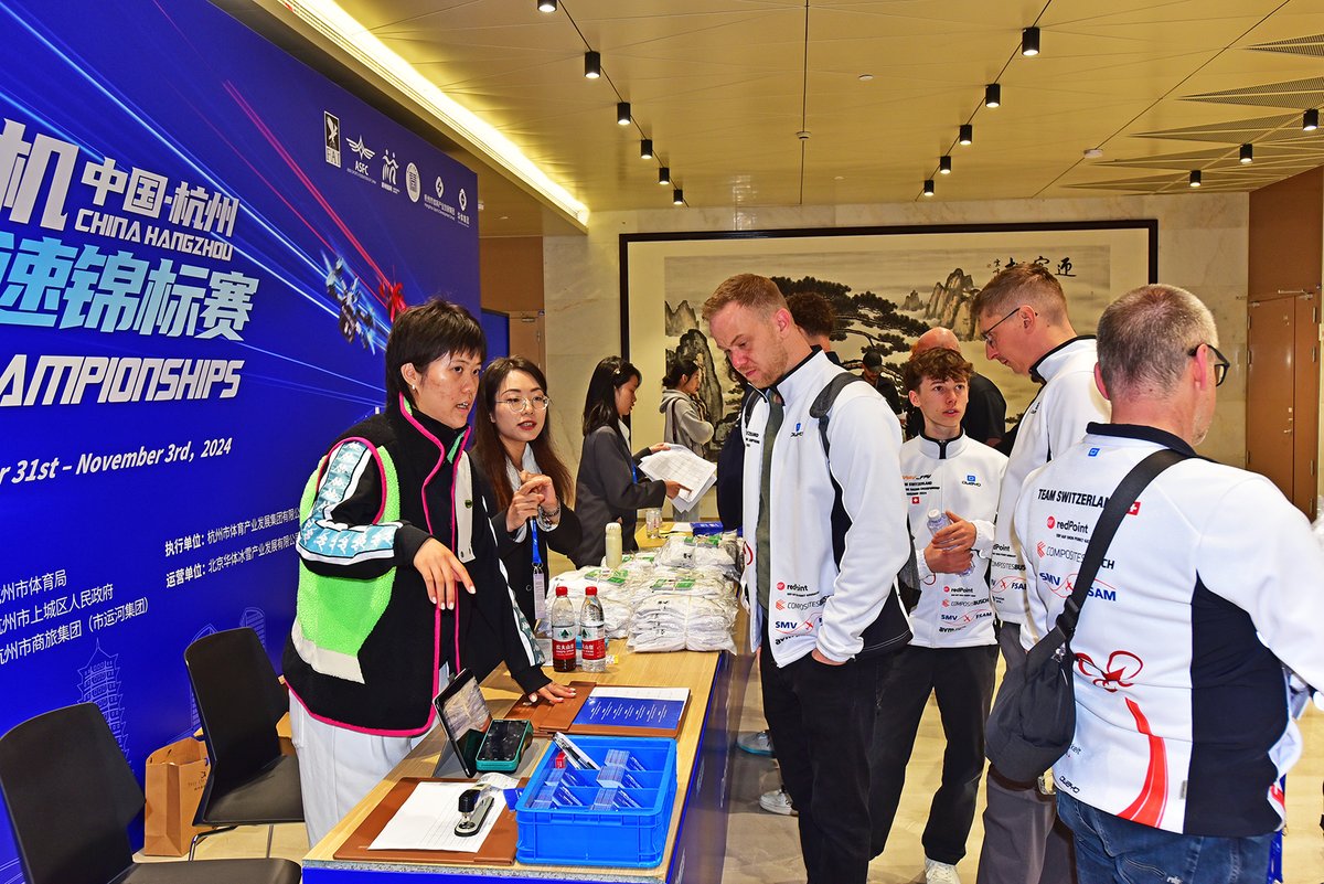 drones_fai's tweet photo. 📋✅ Registration: Ensuring a smooth start to the 2024 FAI World Drone Racing Championship! Organisers are:
• Verifying team member presence 
• Checking FAI Sporting Licenses 
• Confirming registration fee payments 
• Distributing accreditation cards and souvenirs
#drones https://t.co/r1fIOREPVw