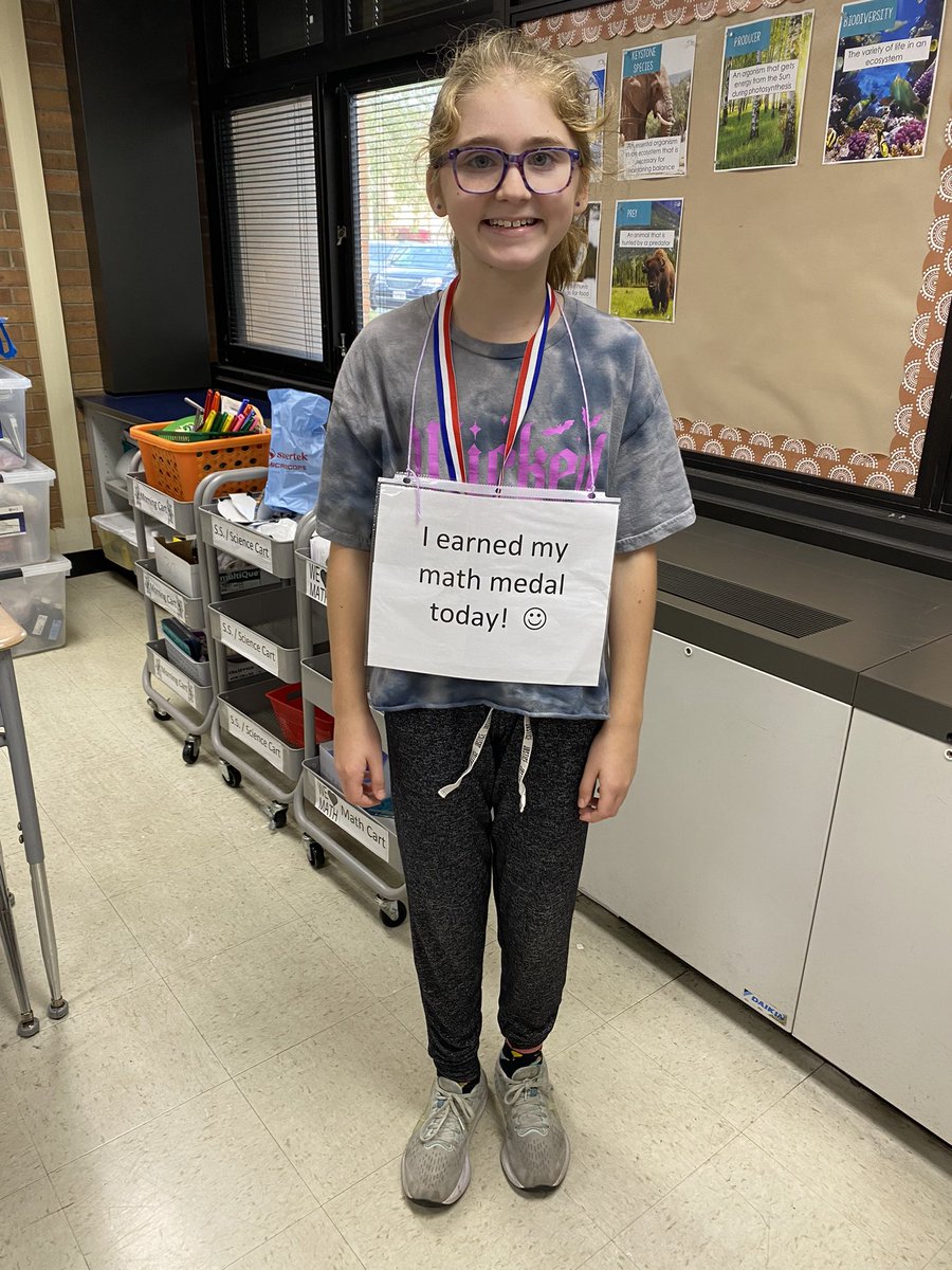 Hooray!  Belle earned her math medal today.   Way to go!😁 
#BeEvergreen