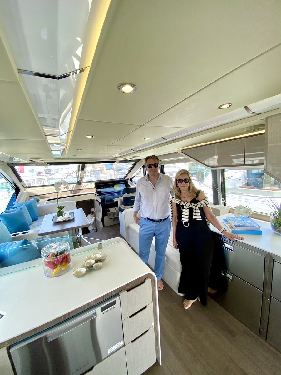 CruisersYachts's tweet photo. The interior design team of Luiz and Christina de Basto taking their initial walkthrough of the brand new Cruisers Yachts 55 Fly. Be sure to see this beauty on Dock GH at FLIBS 2024! #FLIBS #55Fly #boatshow https://t.co/Qm85yQHETA