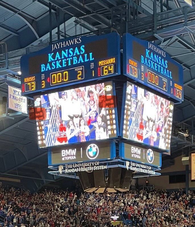 JHawkOverreact's tweet image. For reference (apologies for the terrible photo) the old scoreboard had team fouls indicated, as highlighted.  You also could glance up from live action to view stats, rather than peering into a remote corner and missing what’s going on on the court. #kubball