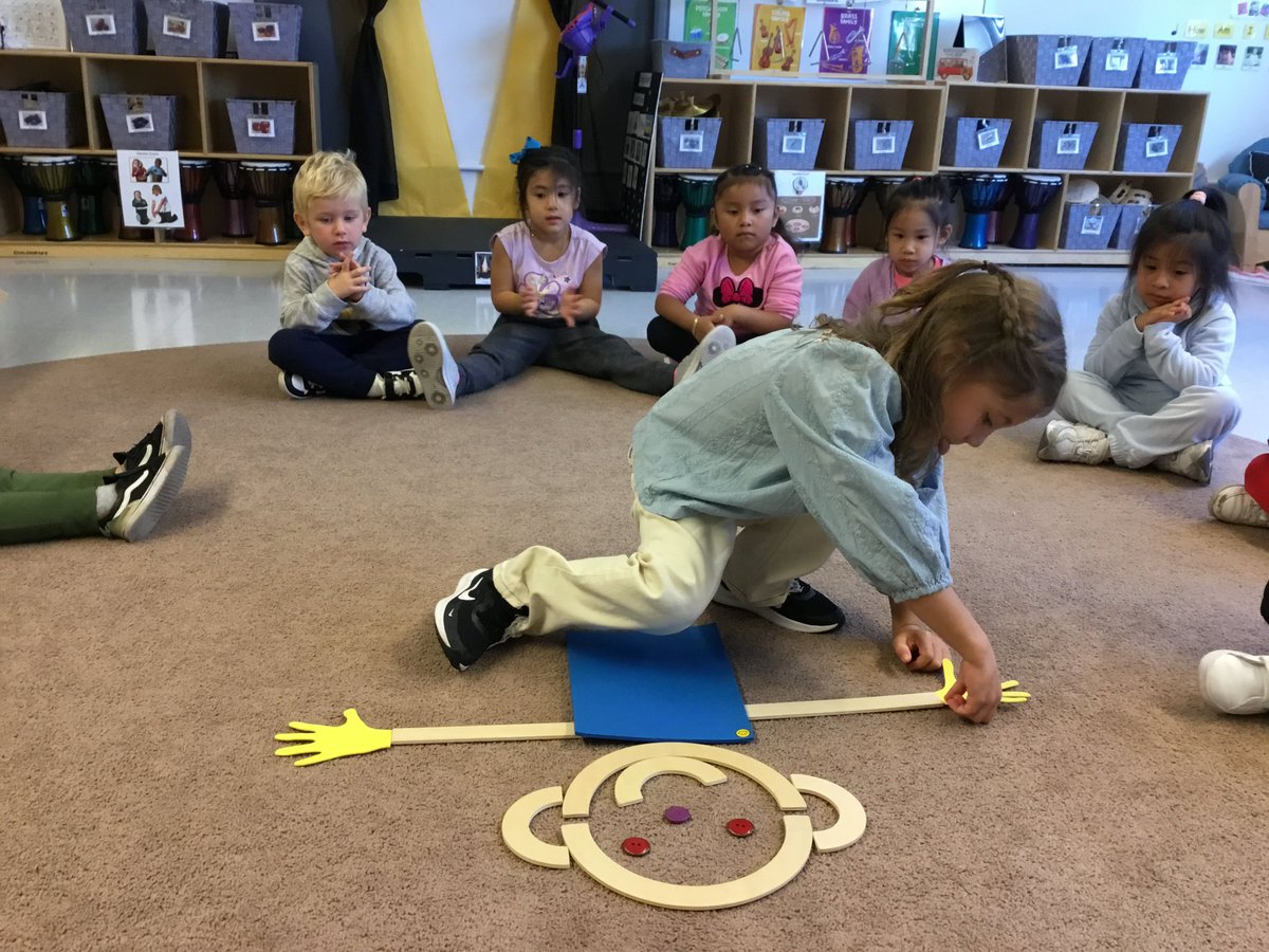 In Mrs. Obara’s music room at Z075, our students practiced their fine motor skills by dancing with scarves and learned about body parts by creating Mat Man!