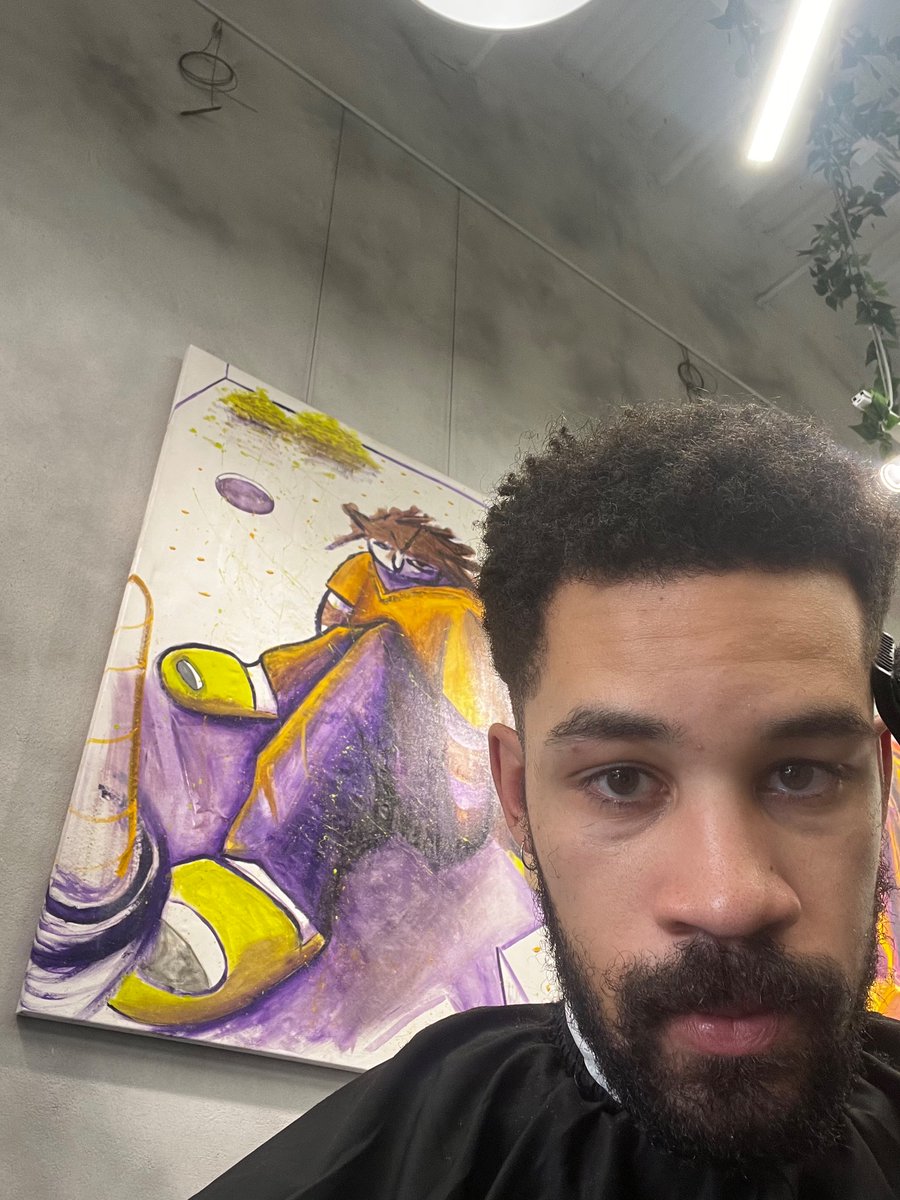 getting my haircut in front of one of my paintings it’s nice here