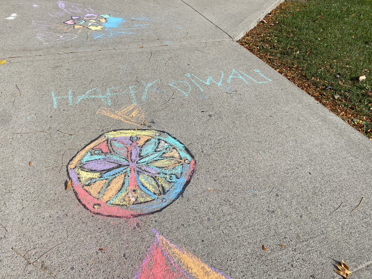 Leaders working to create an activity to help our students learn about the celebration Diwali.