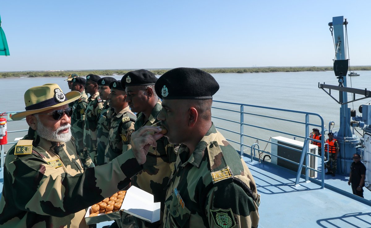 narendramodi's tweet photo. Went to one of the floating BOPs in the Creek area and shared sweets with our brave security personnel. https://t.co/aZ6pE1eajK