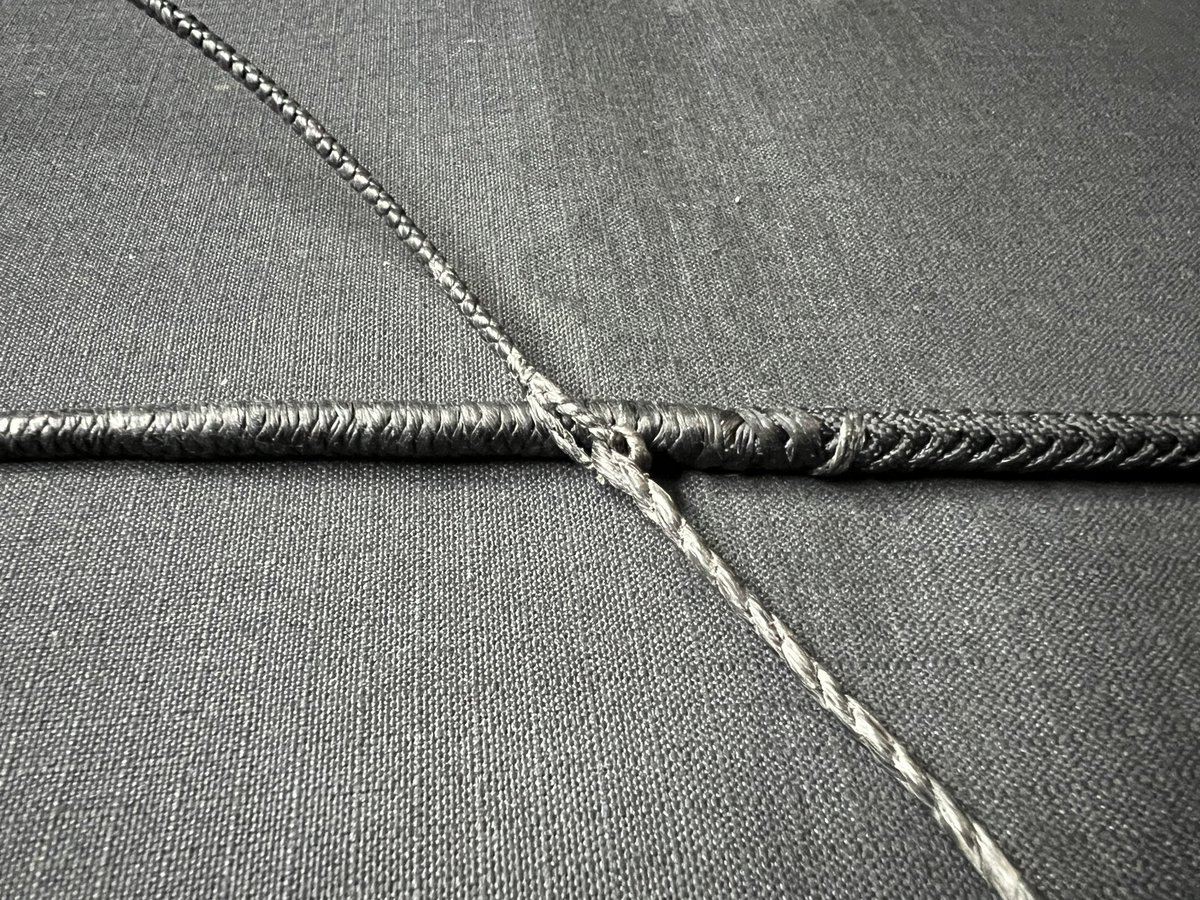 Custom Order! 

This was a huge project that took a lot of time to build. 
A 32 plait “Alpha Series” 8ft bullwhip with a short 6” handle built in a plain black colour way. 

A heavy slow moving steady whip with a steady taper to the cracker tip. 3 pass 9x8 and 7x6 knots.