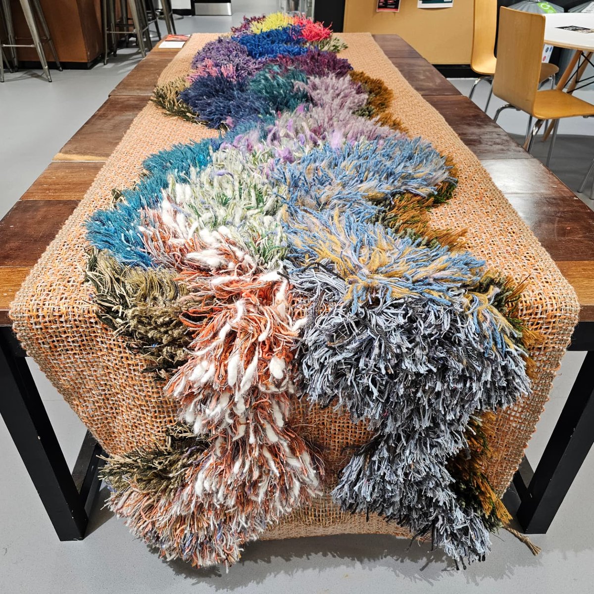 weaving_kate's tweet photo. Meet the Good Intentions Rug - a comment about all that craft material we accumulate without thinking in our studios, craftrooms or spare rooms! Produced for the recent Making Futures: Beyond Crafts conference held at @artsuniplym

#Sustainability #art #craft #materials #weaving https://t.co/0WGjNgZyKO
