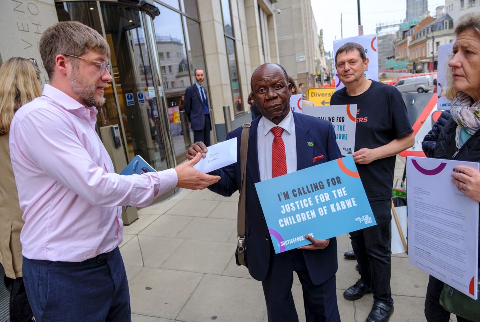 Today, Barry Mulimba, on behalf of the Children of Kabwe went to the #AngloAmerican offices with an open letter signed by <a href="/PeterHain/">Peter Hain</a>, which demands an end to the decades of injustice and urges Anglo American to provide immediate redress to the children and women of Kabwe –