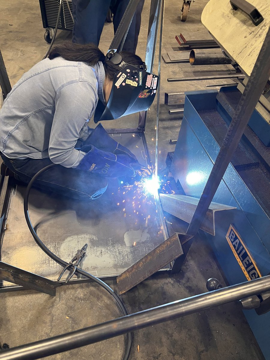 Nothing better than having a beginning young lady working on a project for the Principal. Building America.