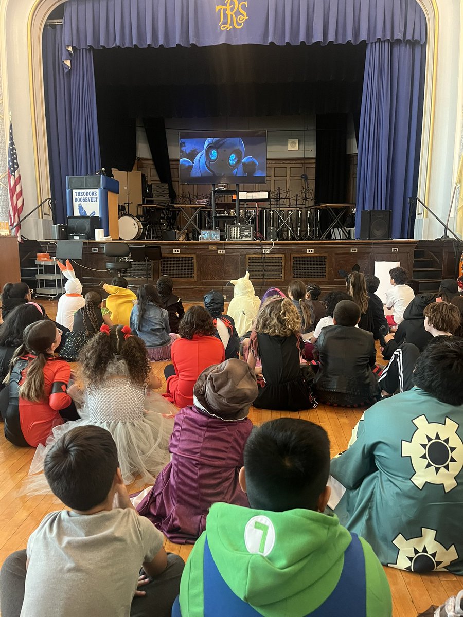 4th graders watching The Wild Robot after reading (and LOVING!) the novel 🤖 Happy Halloween! 🎃