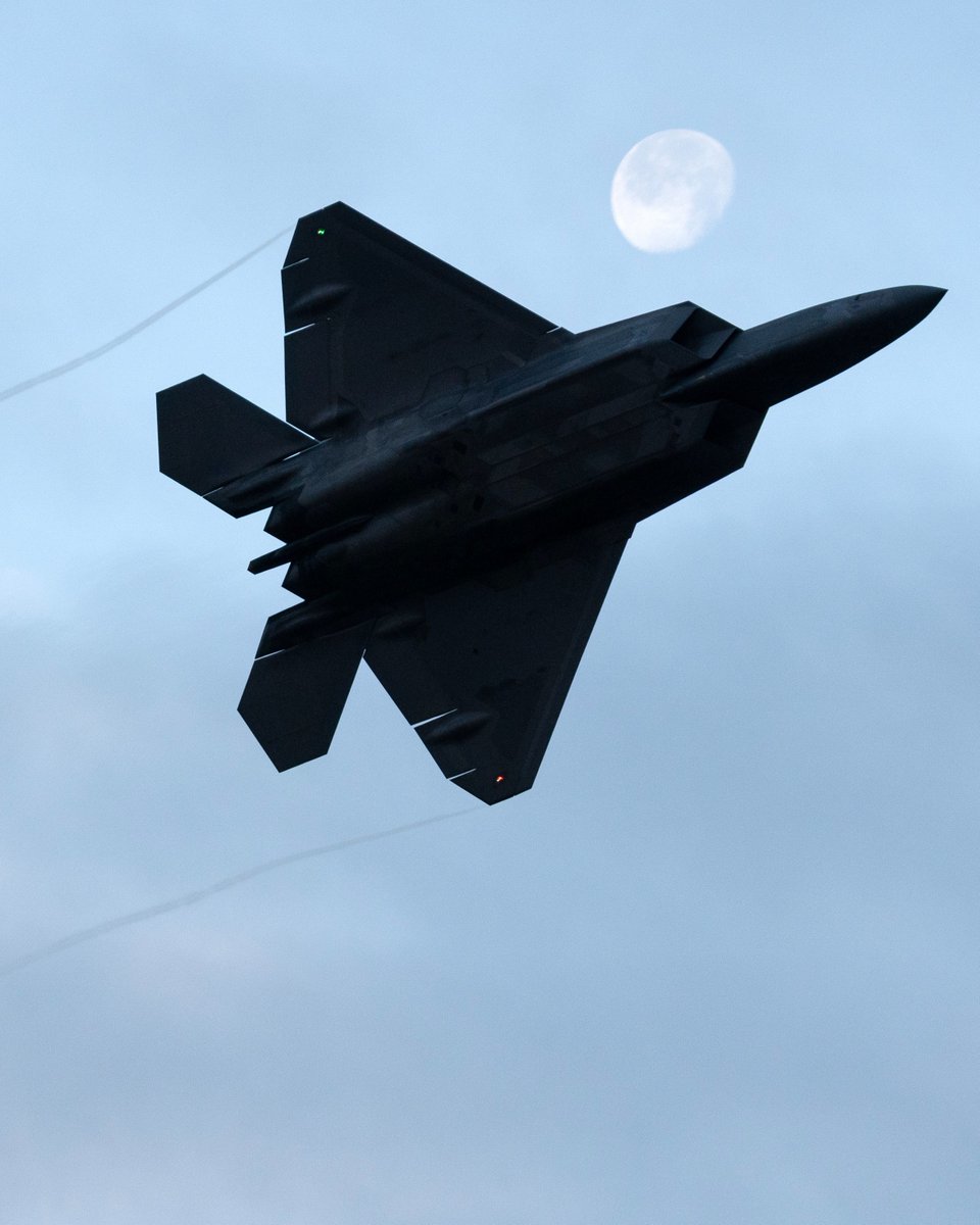 WeAre_AirForce's tweet photo. F-22 or bat flying through the sky? You never know on Halloween night. https://t.co/R16bpXoGqa