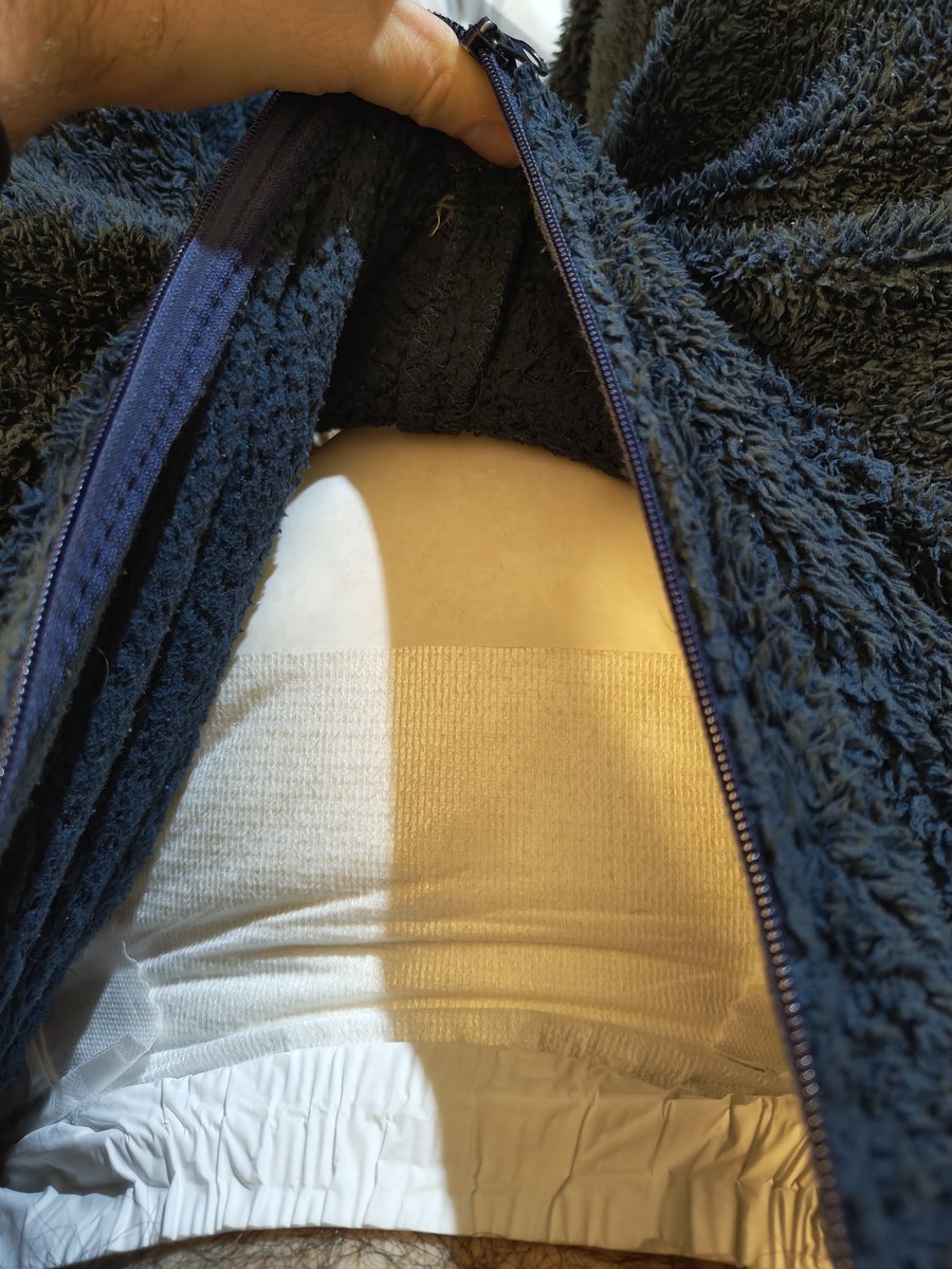 My onesie keeps me warm, my pamp keeps me warmer ❄️🍼