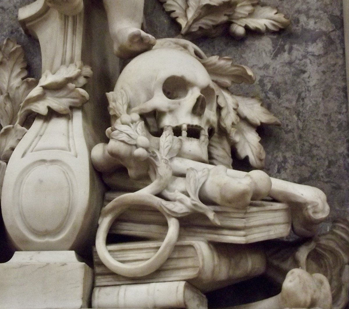 #31DaysOfGraves Day 31: skull 
“I lived, I loved, I quaff'd, like thee:
   I died: let earth my bones resign” Byron.

Theophilus Salwey Esq. d1760 downtrodden by a cherub in St Laurence’s church, Ludlow. #Halloween